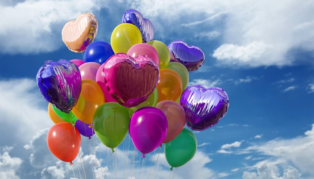 balloons floating through the air